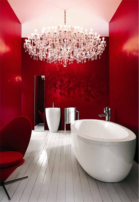 Not sure if i'm brave enough for an entire red painted bathroom... but it looks stunning